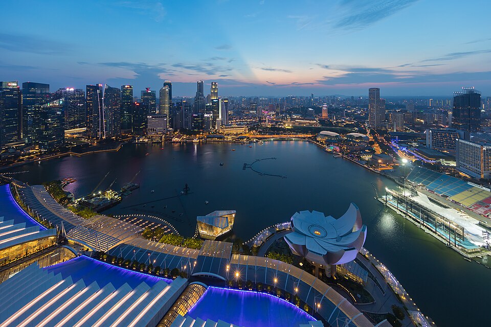 The towers of Singapore's Central Business District at dusk, photographed from the observation deck of Marina Bay Sands